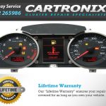 Audi A6 instrument cluster displaying speed, coolant level, and warning lights.