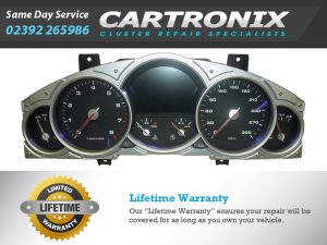 Instrument cluster for Porsche Cayenne with speedometer, tachometer, and fuel gauge displayed.