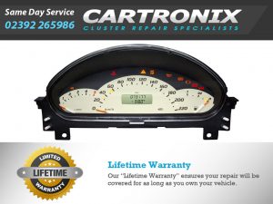 Dashboard cluster repair service by Cartronix with speedometer and odometer readings.