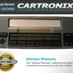 Range Rover radio control unit with buttons and display for audio functions.