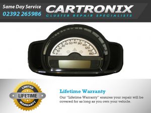 Speedometer repair service advertisement with a gauge and warranty information from Cartronix.